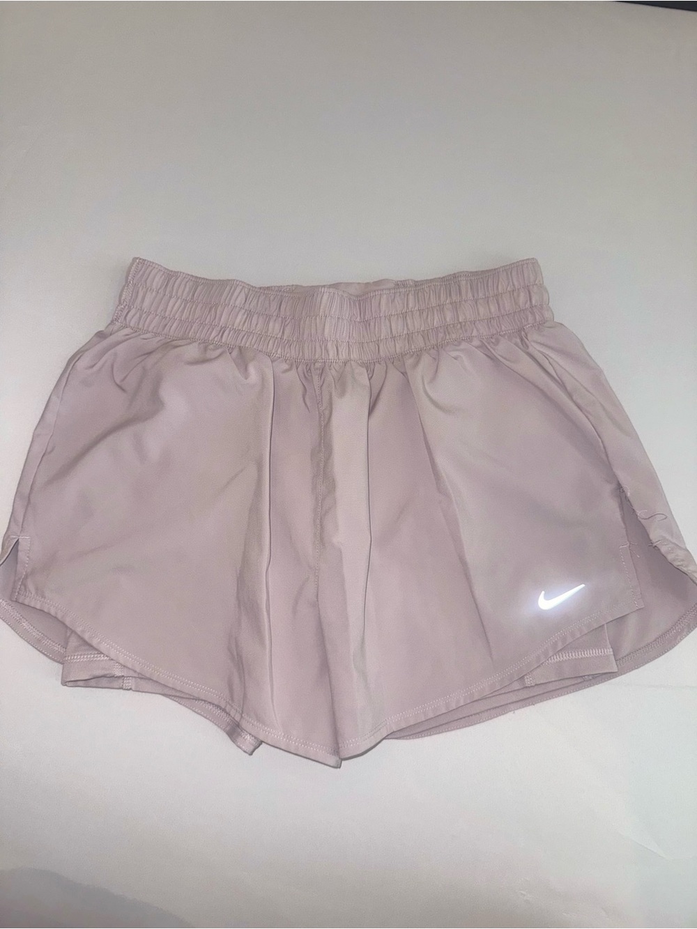 Nike Women’s Pale Pink Dri Fit Double Lined athletic Shorts with Reflective Swoo